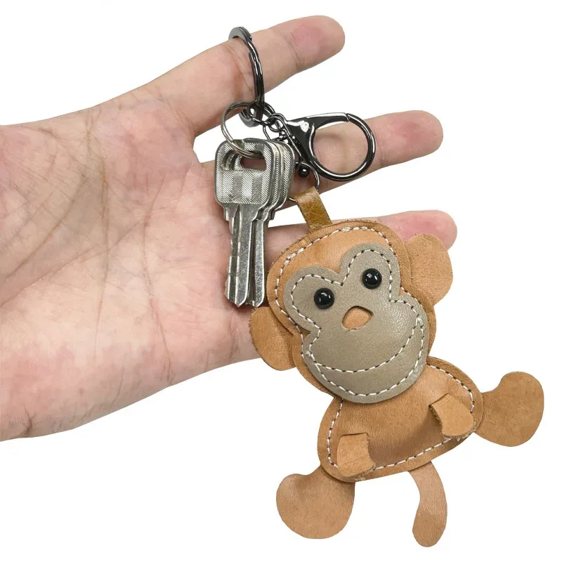 nouveau mignon singe en cuir de vache porte-clés mini hommes et femmes sac à main pendentif à la mode porte-clés sac à bagages pièces accessoires