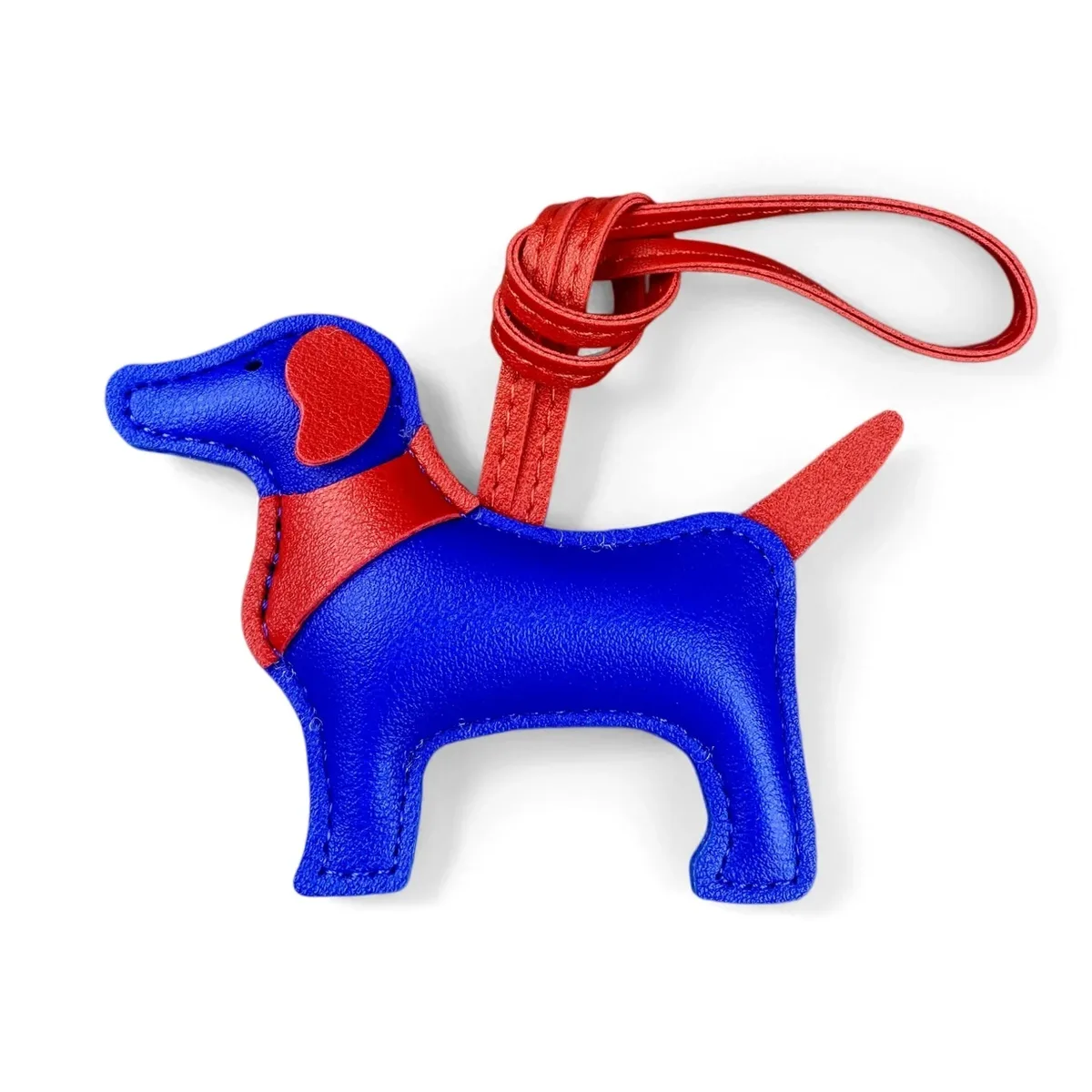 sac dos cuir motif chien silhouette orelles criniere couleurs contrastantes ornements voyage usage journee accessoires sac main porte clefs