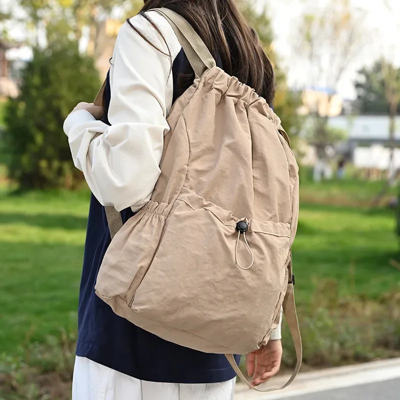 nouveau sac à dos pliable à cordon de serrage, imperméable, léger, grande capacité, sac de sport, sac de voyage portable pour la randonnée en plein air et les loisirs.