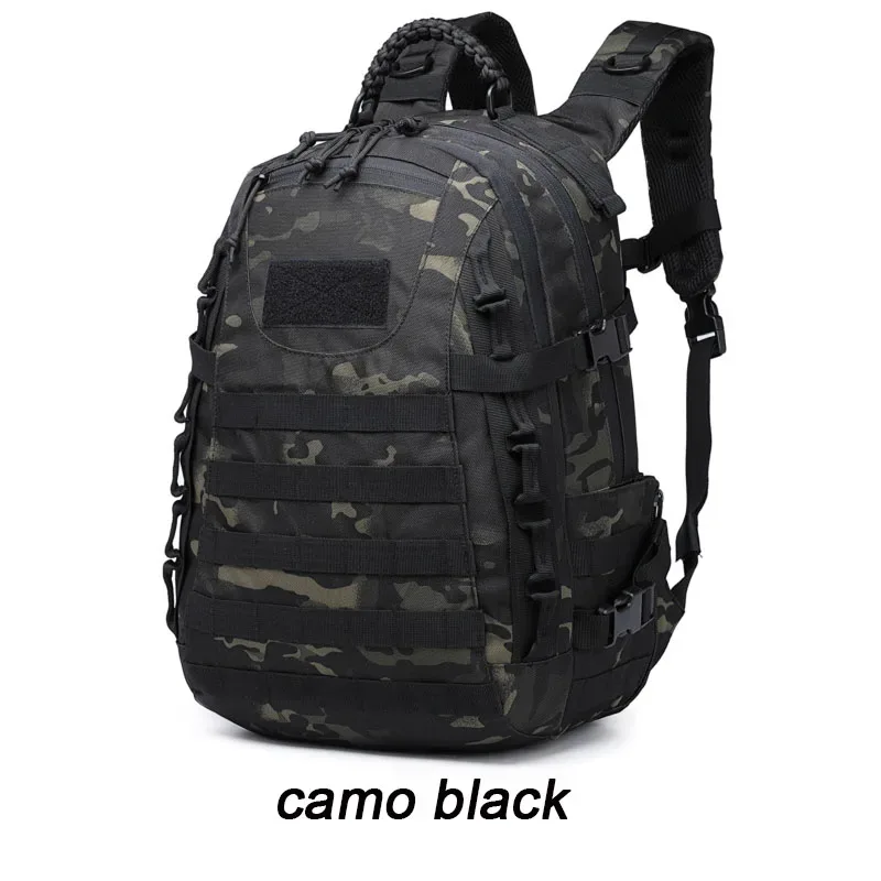 sac dos vert olive bandes marron claires motif camouflage fermeture velcro ajustable boucles métalliques usage extérieur capacité grande