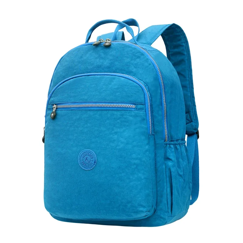 sac dos nylon gris anthracite compartiments poches latérales glissière accessoires pompon porte monnaie voyage école adolescente