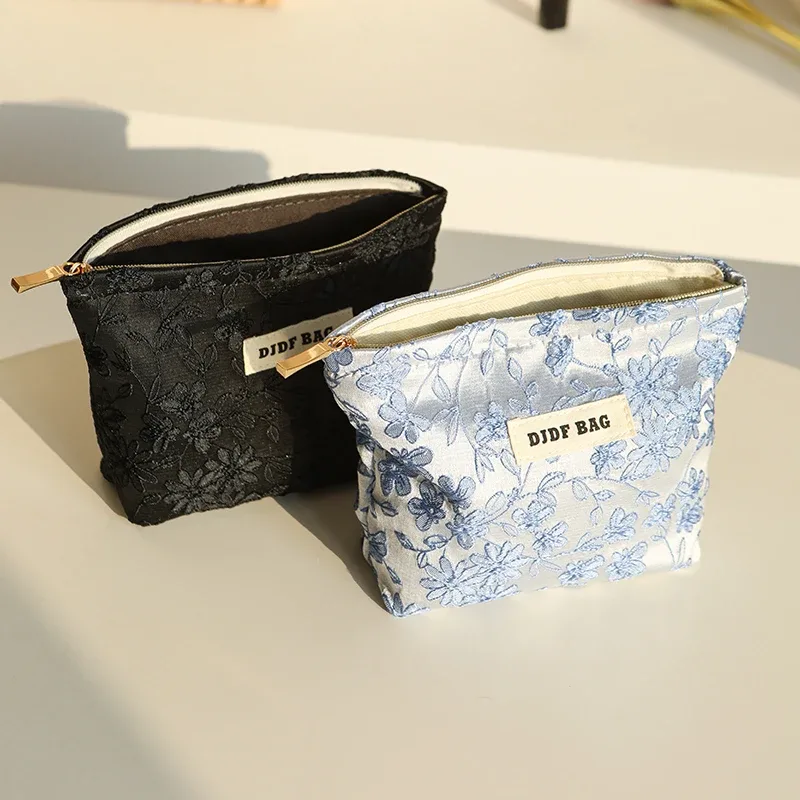 nouveau sac cosmétique femme de petite taille portable bleu broderie mini sac de rangement de serviettes hygiéniques sac de clé de monnaie de banlieue sac de carte bancaire