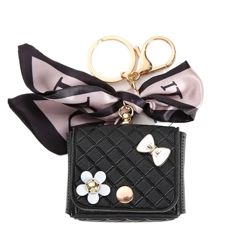 nouvelle pochette de rangement en cuir 2026 pour écouteurs, mini porte-clés créatif, pendentif couleur unie, étui pour écouteurs bluetooth