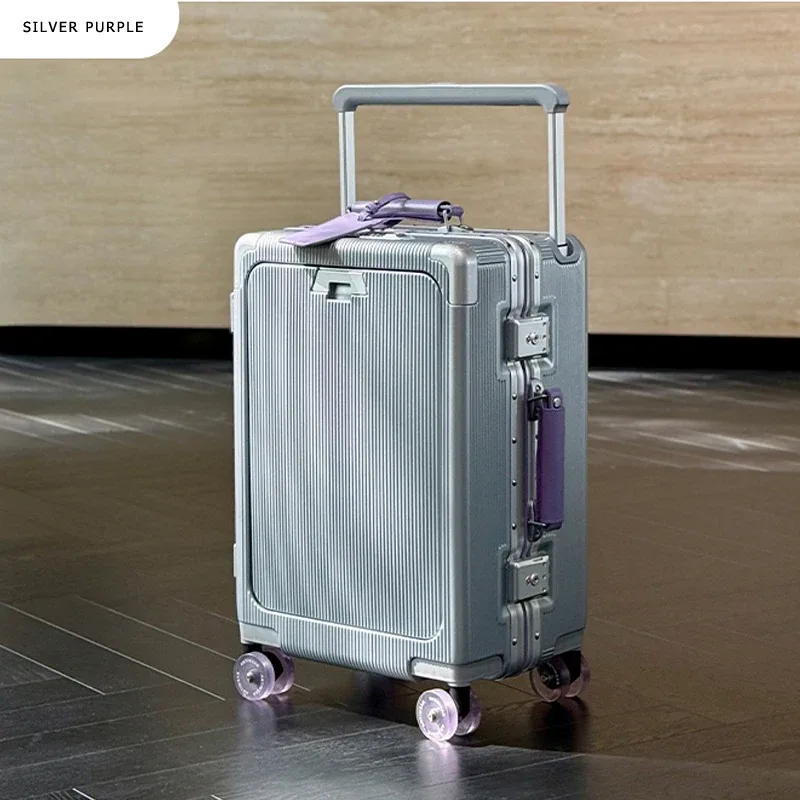 valise roulettes toupie poignée supérieure texture rugueuse couleur blanche accents violet doré usage voyage