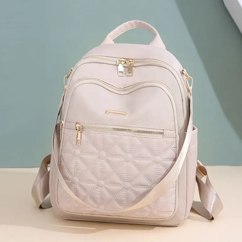 sac à dos en nylon léger pour femme, sac à dos simple polyvalent, sac de voyage pour femme, design de luxe, tendance décontractée, monochrome, nouvelle mode, 2025