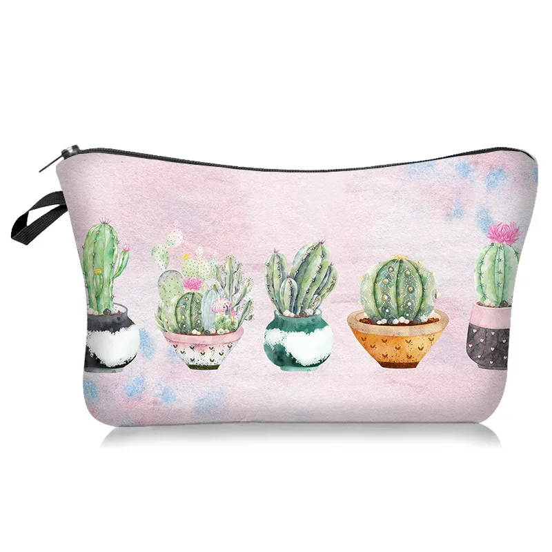 le nouveau sac de maquillage de la série à motifs légers et frais se vend bien. c'est un sac de rangement à main avec une housse en tissu polyester.