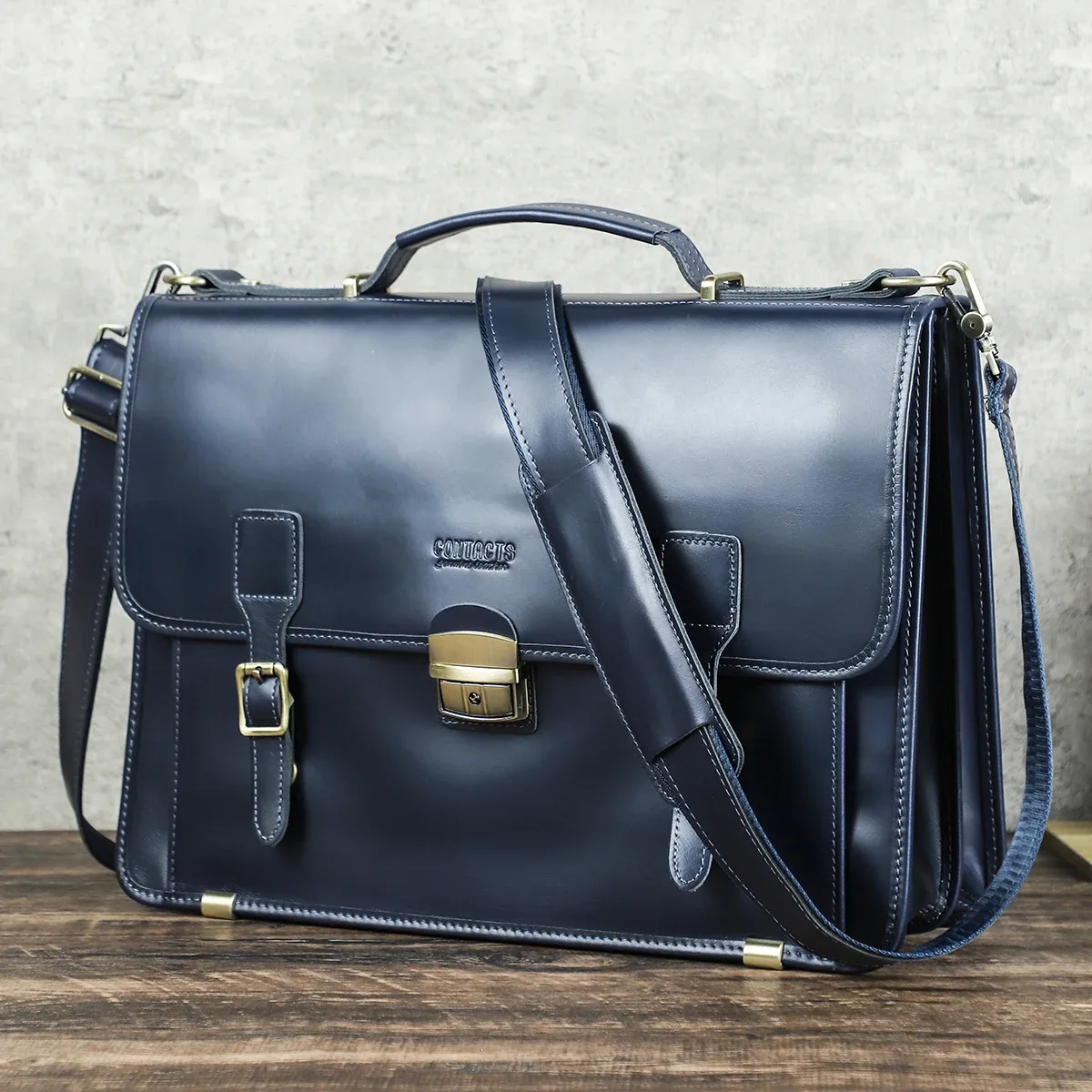 porte documents cuir vrai crazy horse marron foncé accents dorés compartiments poignées robustes sac main bandoulière voyage bureau
