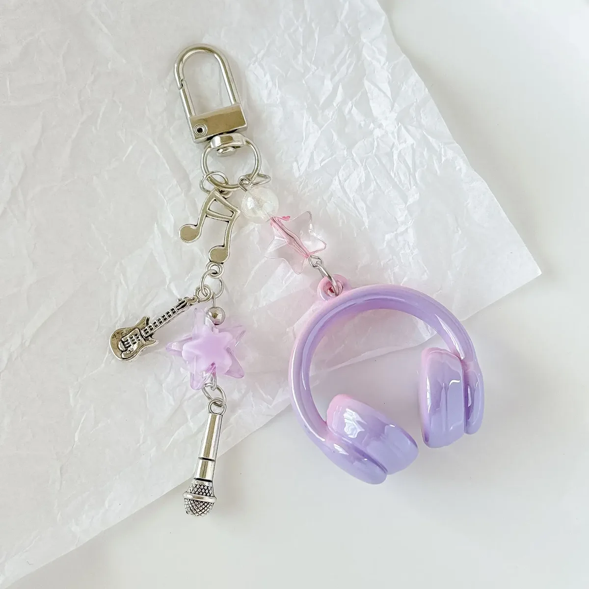 porte clé musical chaine métal accoutrements musicaux petit pendentif créatif voyage sac main pods casque bouton poussoir écouteurs accessoire voyage
