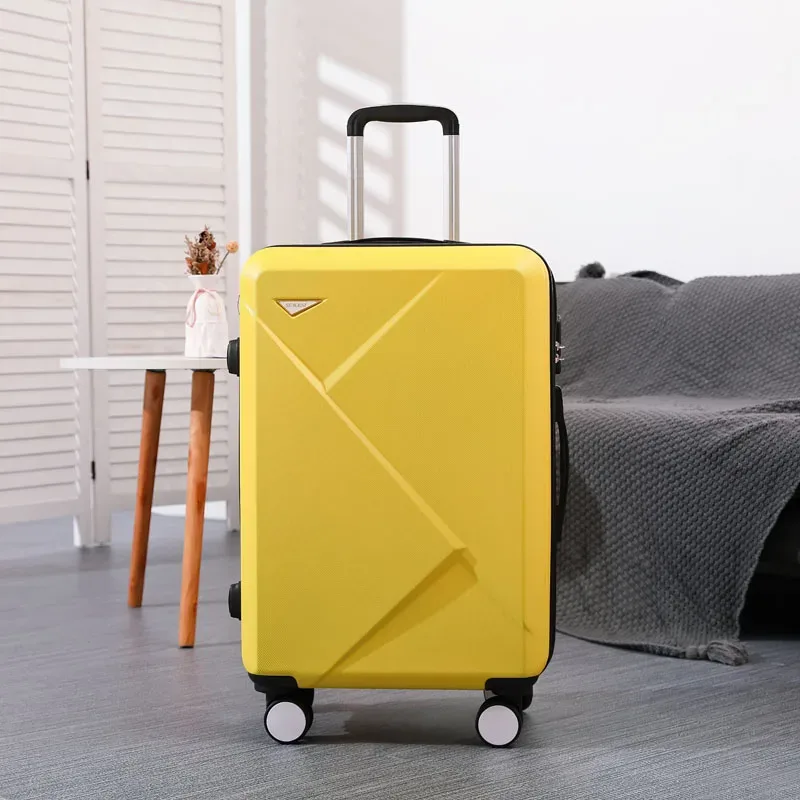 valise abs plastique dur motif géométrique lignes diagonales relief gris rose blanc jaune vert bleu rouge bagage affaires voyage
