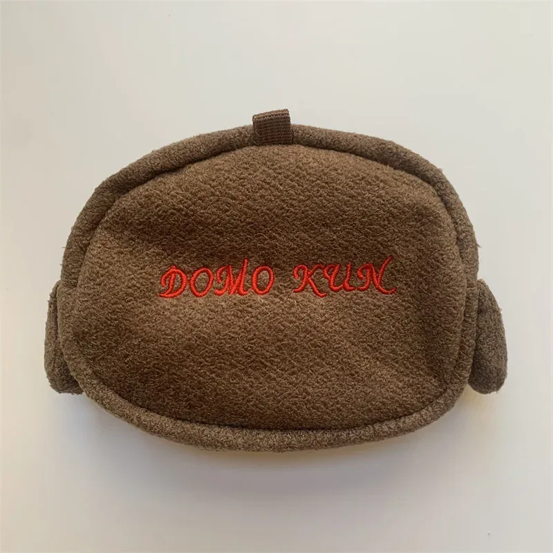 trousse polyester classique dessin animé visage souriant oeil noir bouche rouge oreille marron pochette maquillage voyage beauté