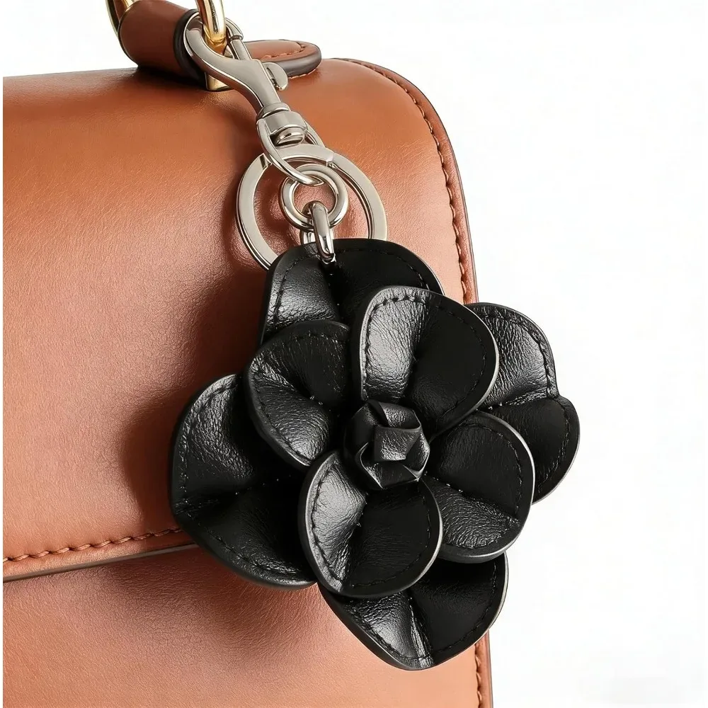 pince clef fleur noire ornementation sac main anneau métallique fermoir superieur décoration tridimensionnelle voyage femmes
