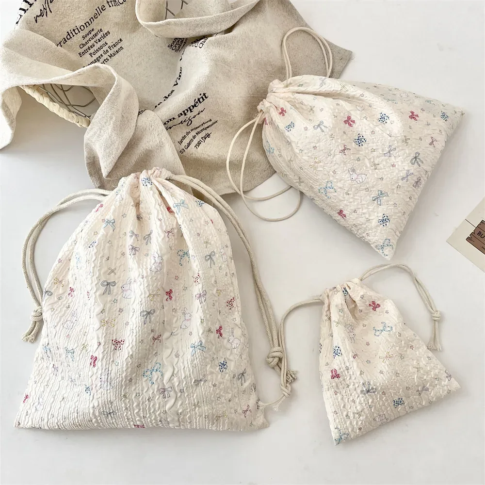 sac à cosmétiques à cordon de serrage en relief, 1 pièce, pochette de rangement de cosmétiques portable mignonne, sac de rangement pour maquillage et accessoires