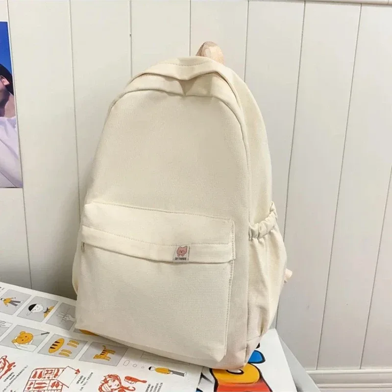nouveau sac à dos imperméable en nylon pour femmes sac de voyage pour femmes sacs à dos cartable pour adolescentes couleur unie bookbag mochila bookbag