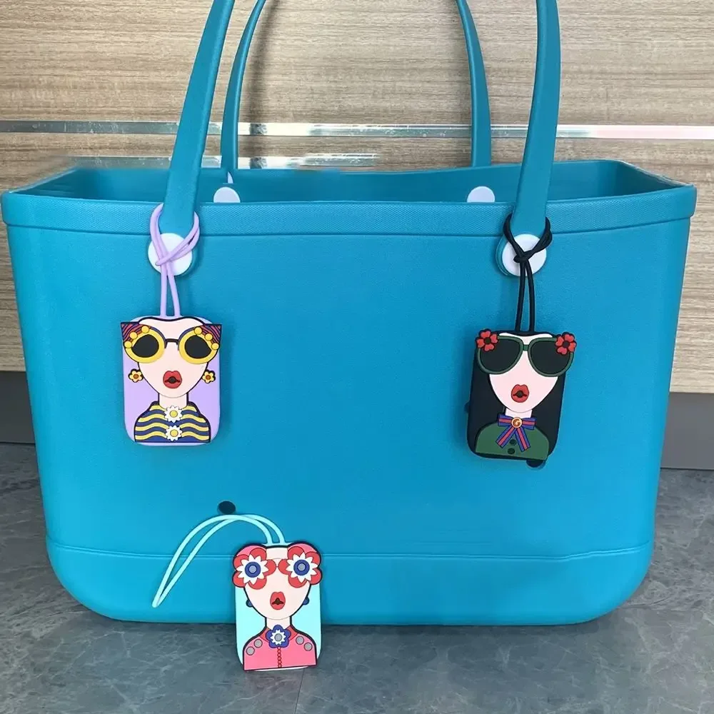 étiquette bagage caoutchouc visage lunettes fleurs géométrique bleu rose blanc voyage identification valise nom téléphone