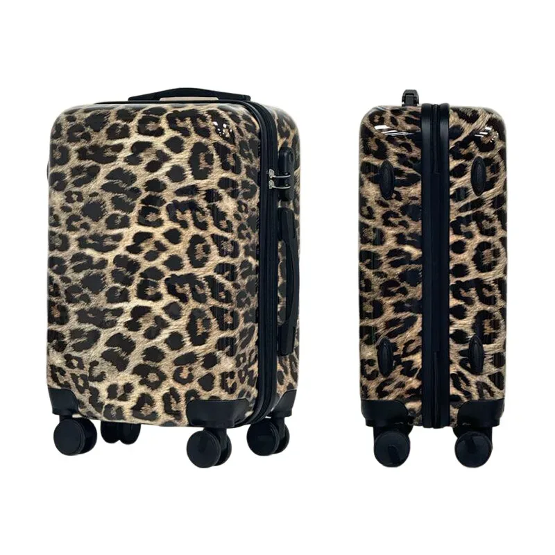 valise motif léopard beige roulettes noires poignée supérieure compartiments intérieur gris clair voyage femme