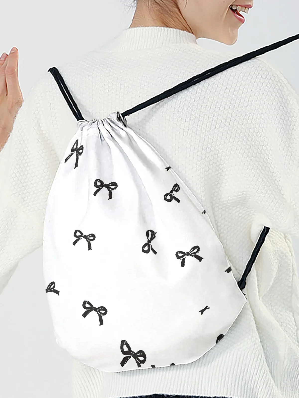 sac à dos noir à cordon de serrage imprimé nœud papillon, sac de sport léger pour la salle de sport, le yoga, les voyages, l'école, le shopping et les trajets quotidiens