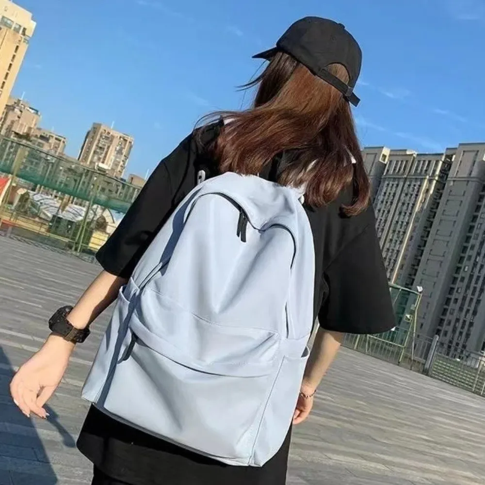 sac à dos d'étudiant moderne de grande capacité, sac d'école décontracté en nylon, couleur unie, bretelles réglables, sac de voyage, école