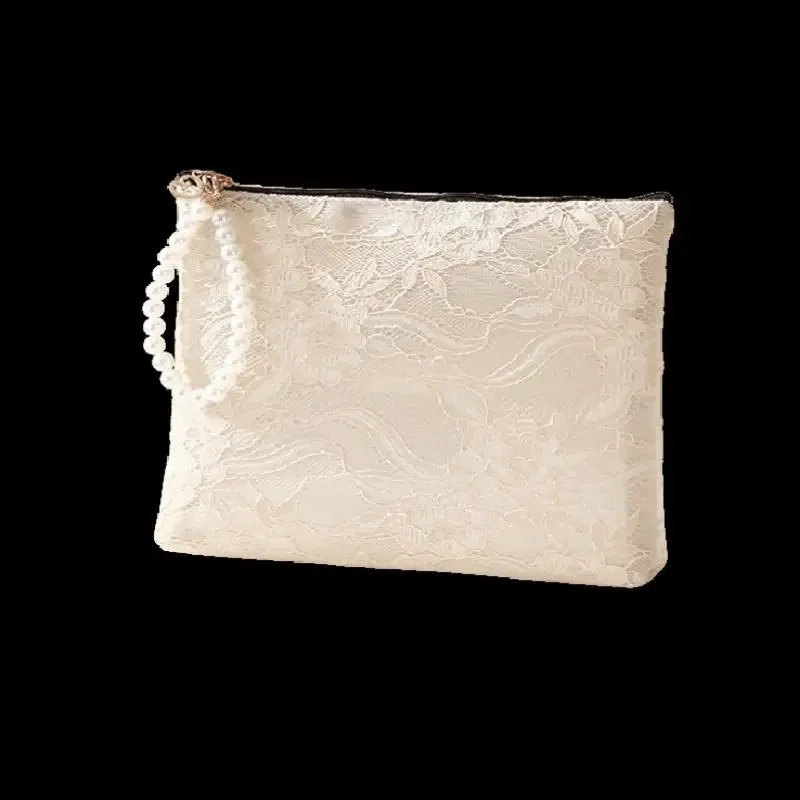 pochette cosmétique en dentelle avec sangle de poignet en perles et design semi-transparent, idéale pour le rangement quotidien du maquillage et les voyages