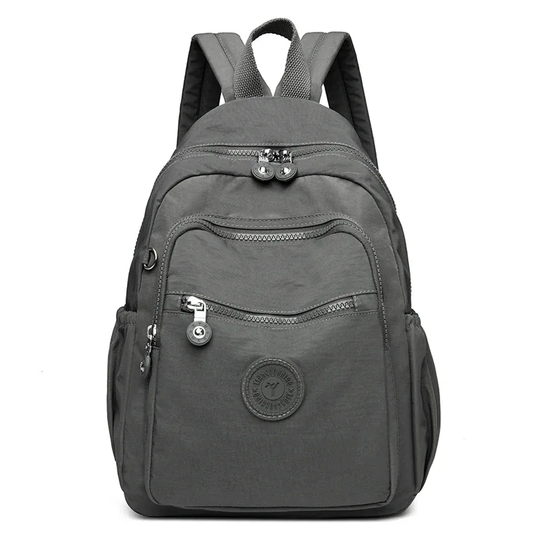 sac dos nylon unisexe noir poche latérale fermeture éclair doublure beige imprimé usage journalier