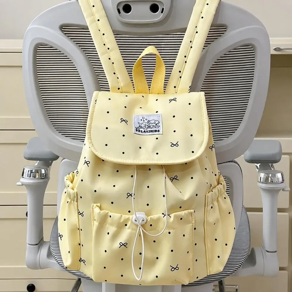 sac à dos à pois avec cordon de serrage, grande capacité, nœud décoratif, double bandoulière, ultra léger en nylon, idéal pour les trajets quotidiens et un usage décontracté.