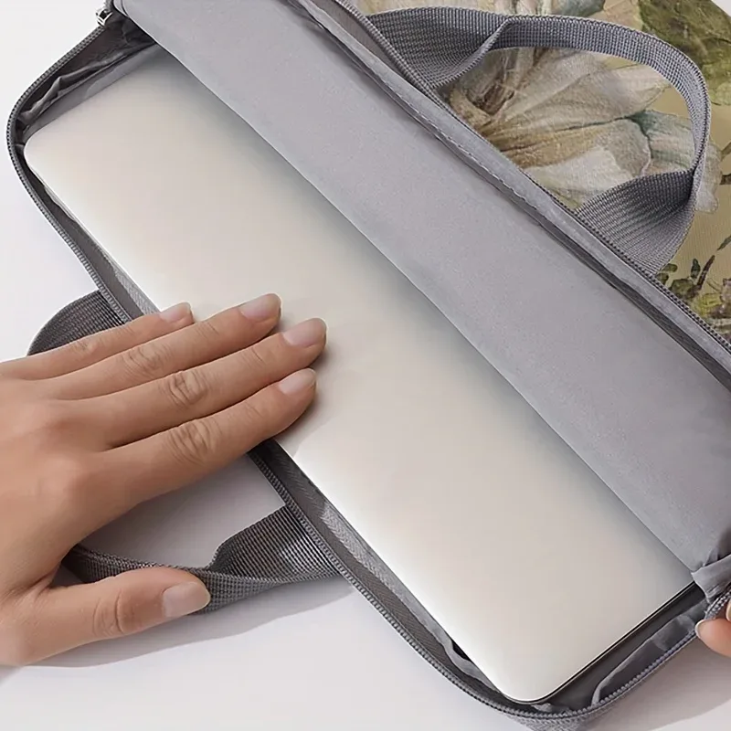 housse polyester motif floral fleurs roses blanches feuilles vertes papillons beige poignée grise protection ordinateur portable voyage