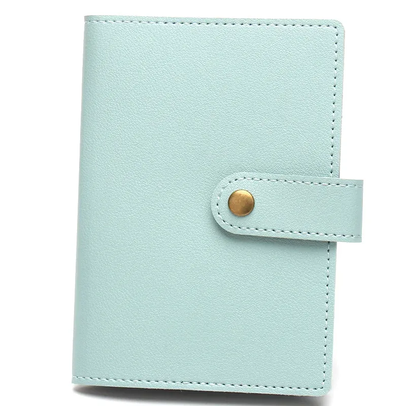 étiquette bagage porte cartes identité voyage accessoires compacts couleurs variées pochettes intérieures fermeture bouton doré usage international