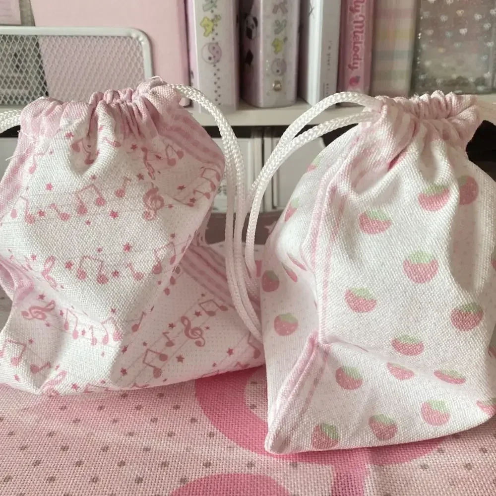 nouvelle pochette à cordon grande capacité motif fraise et note de musique, sac à monnaie portable, pochette de rangement pour maquillage, cadeau, motif dessin animé