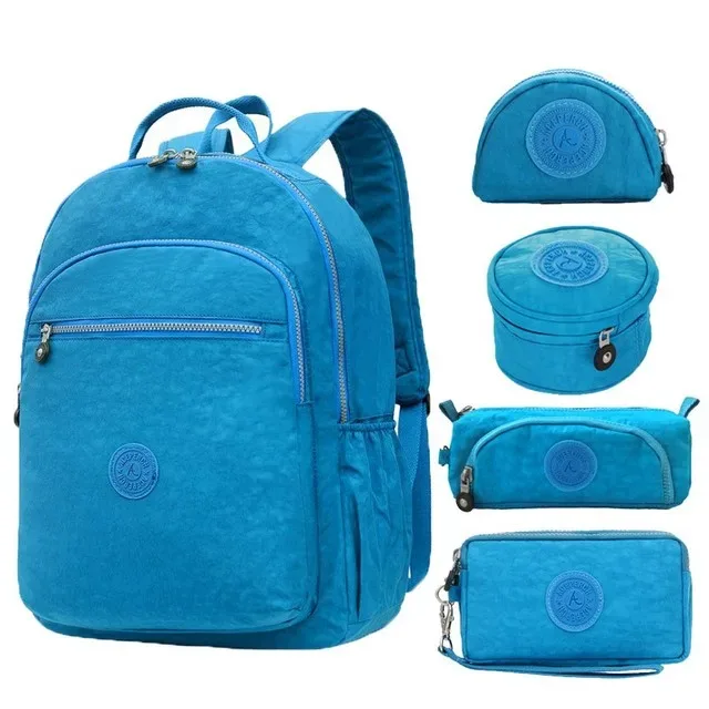 sac dos nylon gris anthracite compartiments poches latérales glissière accessoires pompon porte monnaie voyage école adolescente