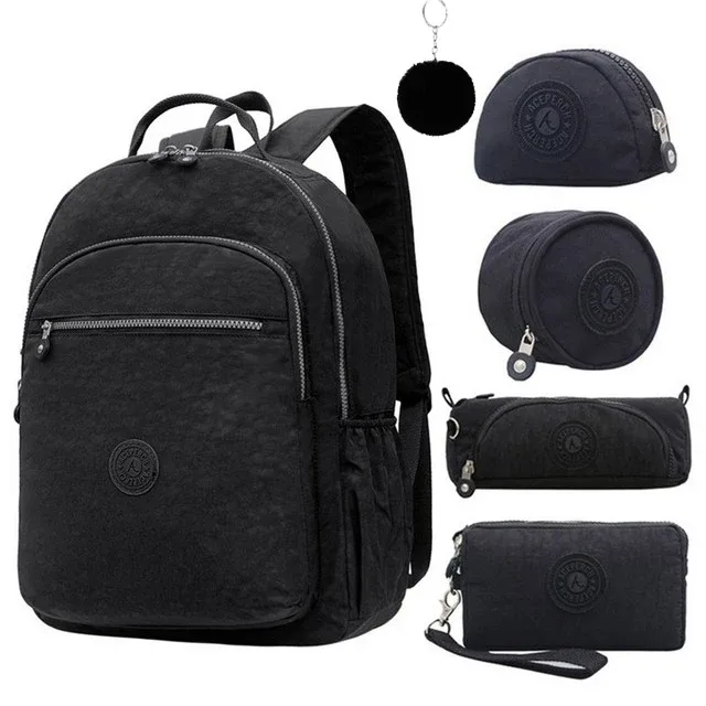 sac dos nylon gris anthracite compartiments poches latérales glissière accessoires pompon porte monnaie voyage école adolescente