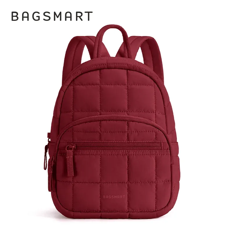 sac dos polyester rose pâle motif géométrique relief matelassé poches pratiques anti-vol organisation objet essentiels voyage