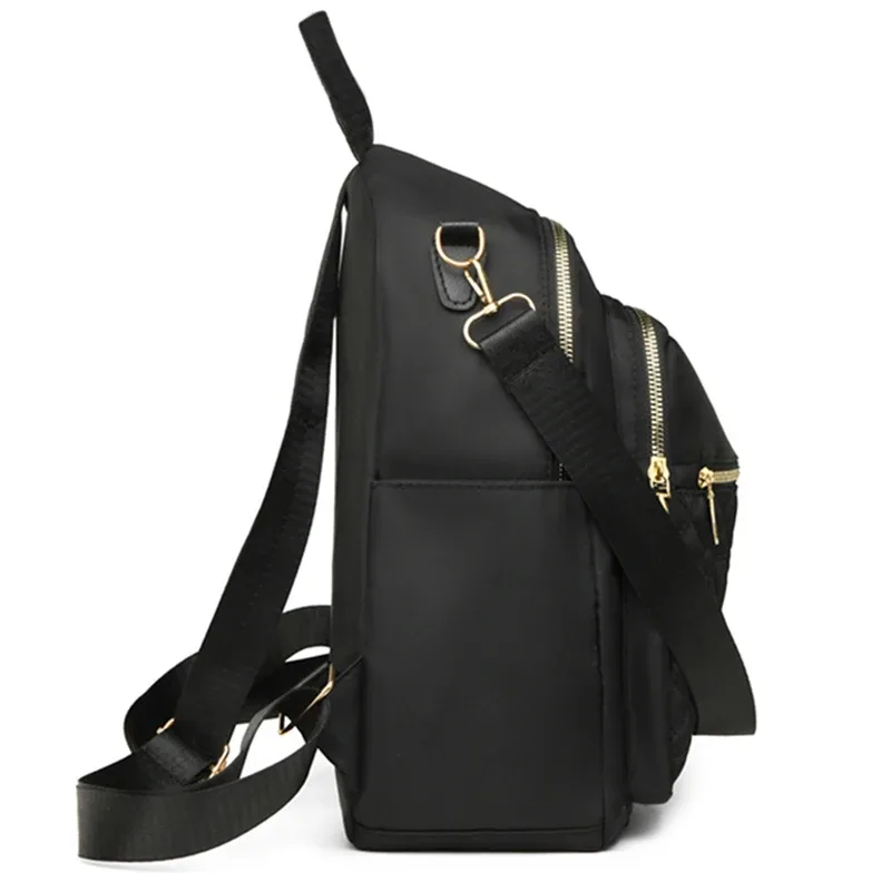 sac à dos élégant en nylon matelassé pour femmes, sac à dos avec quincaillerie dorée, sac à bandoulière multi-emplacements pour les activités de voyage et de shopping décontractées