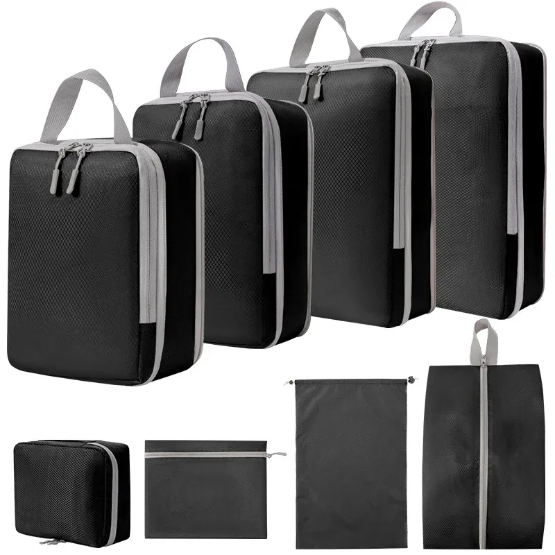 organisateur voyage polyester gris clair poignée noire fermeture glissière compressible sac chaussures rangement cube traçabilité usage polyvalent