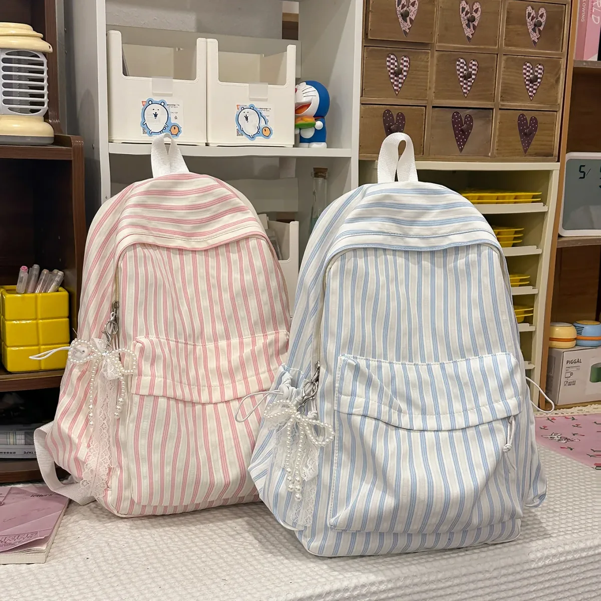 nouveau style japonais, sac à dos décontracté à rayures, grande capacité, pour collégiennes, idéal pour les voyages, sac à dos à double bandoulière pour filles 2026