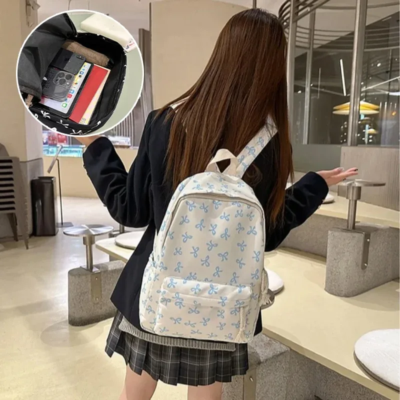 sac à dos tendance et mignon à imprimé nœud pour femme, compartiment pour ordinateur portable avec bretelles réglables, sac idéal pour la rentrée scolaire et les voyages sur le campus