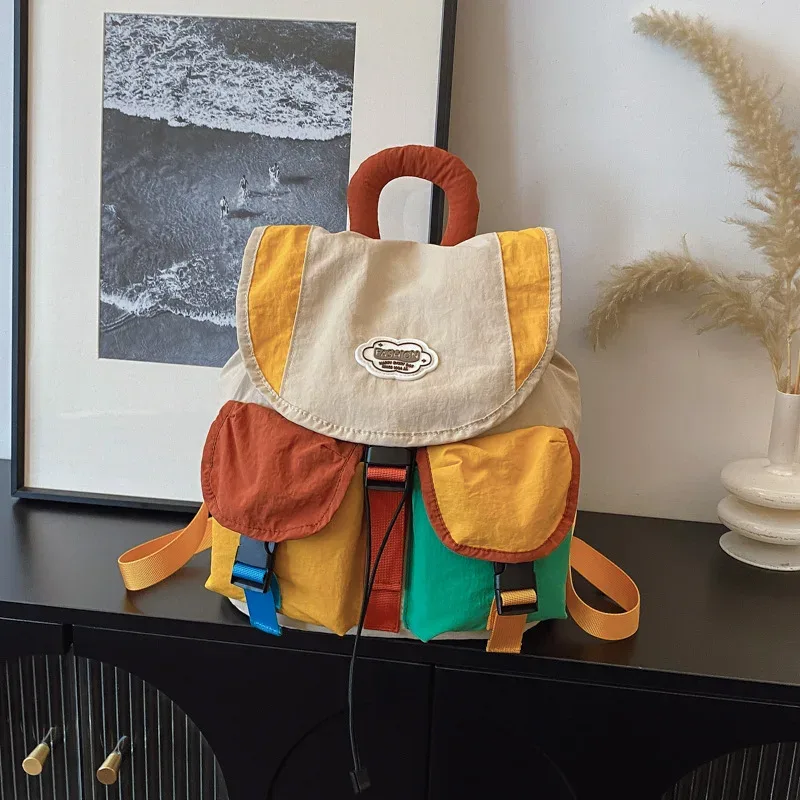 sac dos oxford cloth toile patchwork alphabet décontracté pompon bandoulière arquée anti-vol respirant usage idation voyager école pleinair
