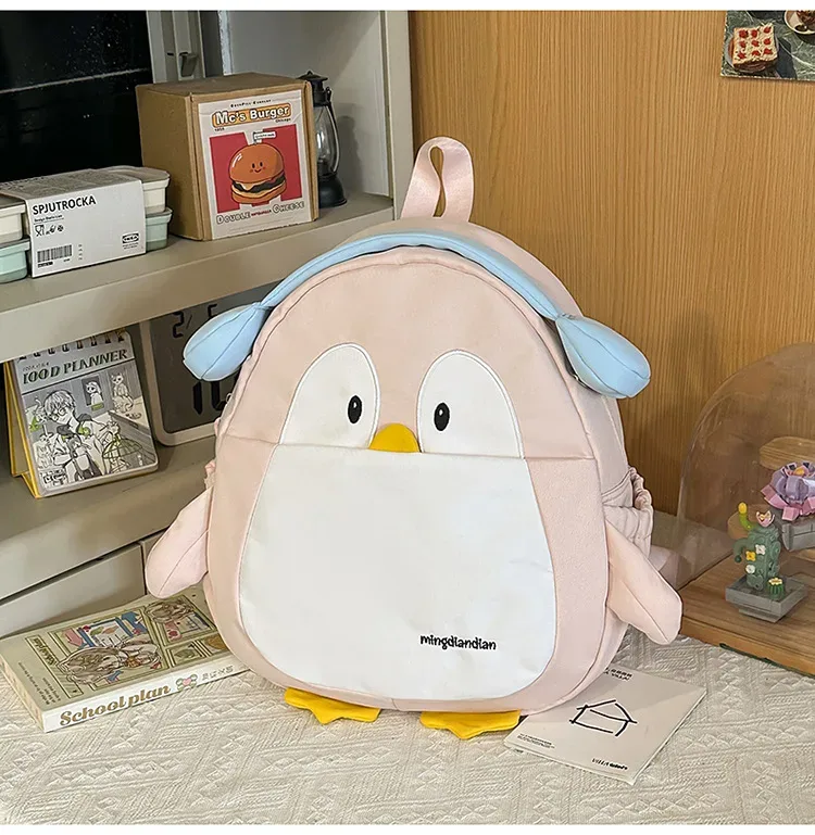 sac à dos mignon pingouin de dessin animé avec breloque moelleuse pour adolescentes, sac à dos kawaii décontracté en nylon, cartable léger pour l'école et les voyages