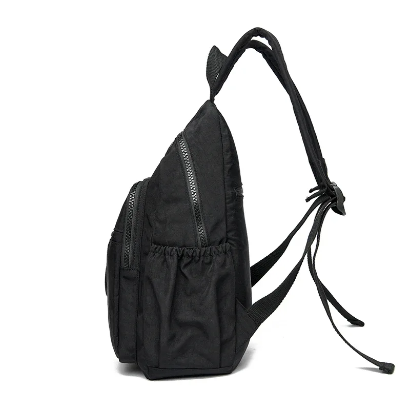 sac dos nylon unisexe noir poche latérale fermeture éclair doublure beige imprimé usage journalier