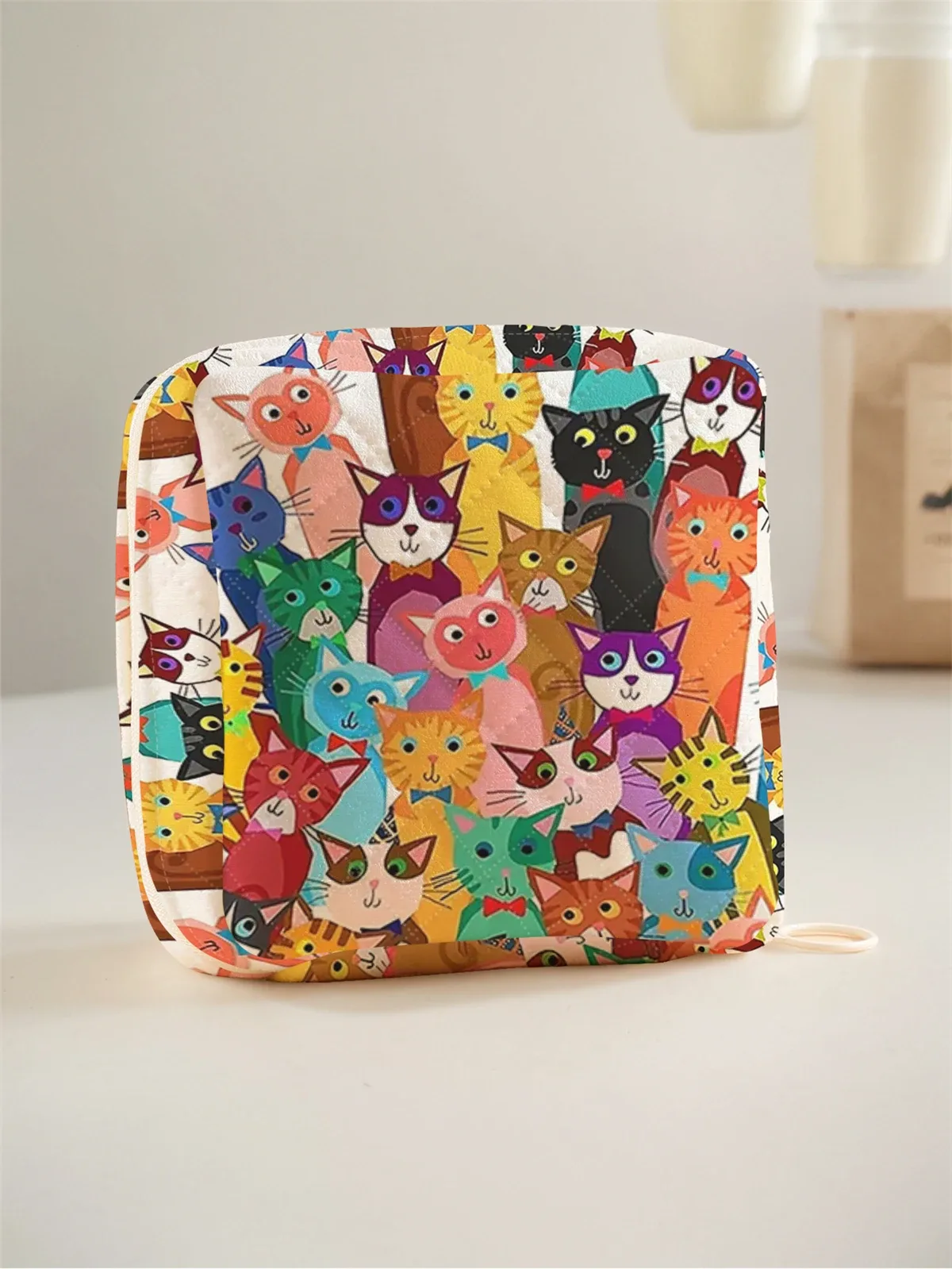 trousse polyester noir blanc motif géométrique smartphone poche rabat bouton pression voyage cosmétique maquillage sac portable