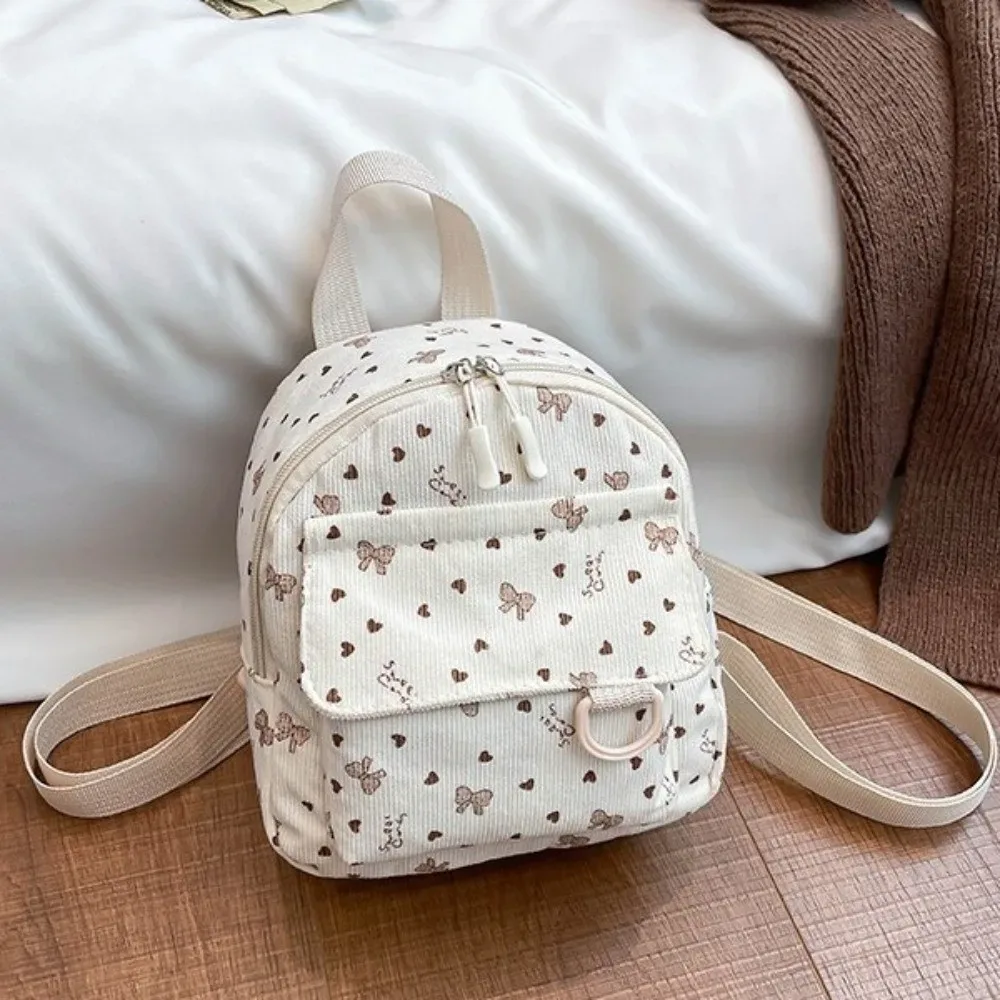 sac à dos mini en velours côtelé mignon et léger avec imprimé cœur et nœud, sac à bandoulière à fermeture éclair, sac à dos multi-compartiments pour usage quotidien