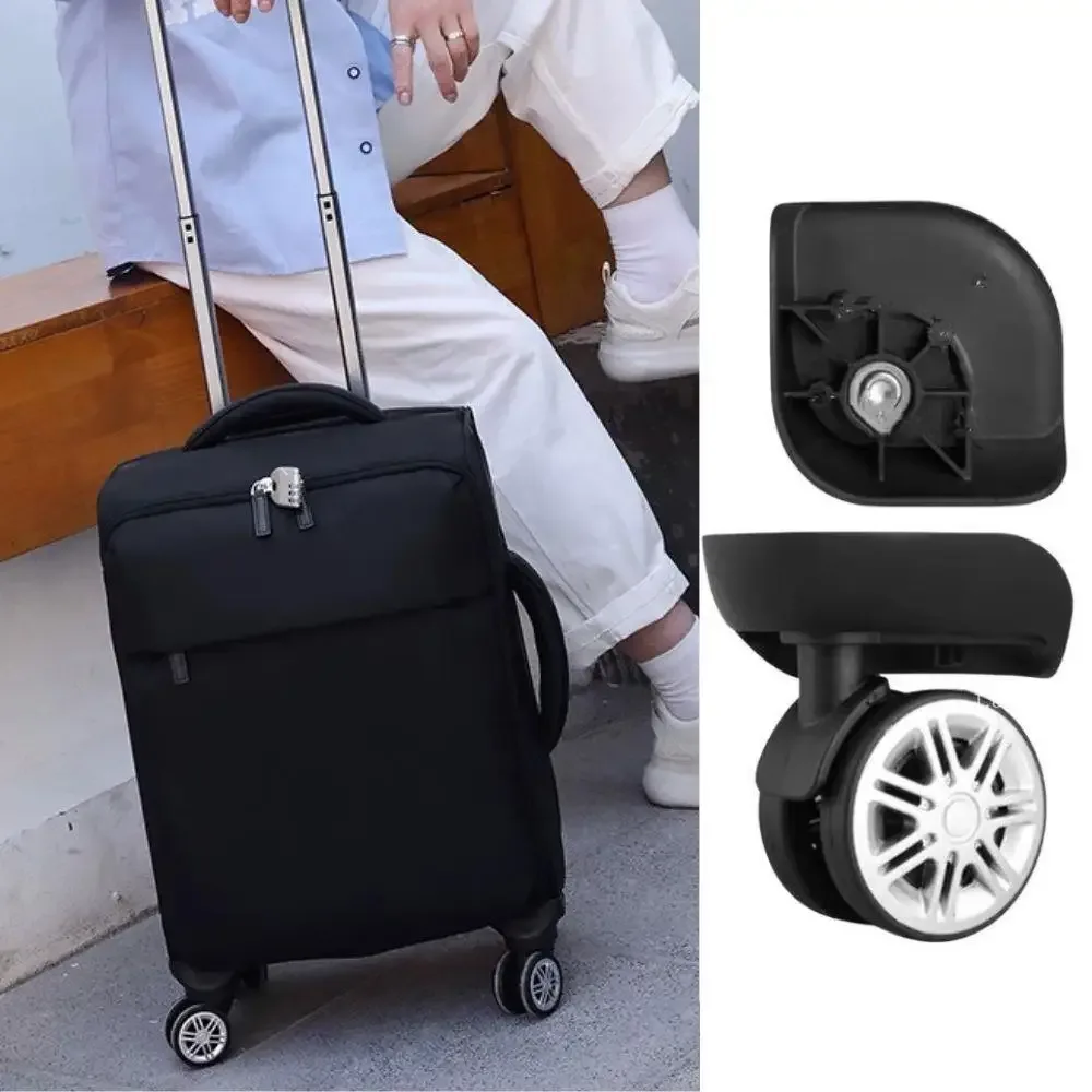 roues bagage caoutchouc silencieuses ergonomiques transport facilité jantes argentées pneus noirs accessoire voyage noir