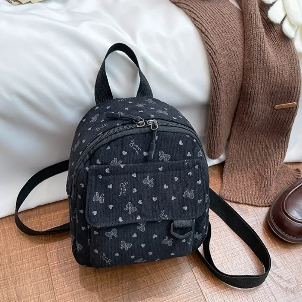 Mini sac à dos en velours côtelé léger, multi-compartiments, décontracté, ouverture zippée, imprimé cœur et nœud, pour adolescentes