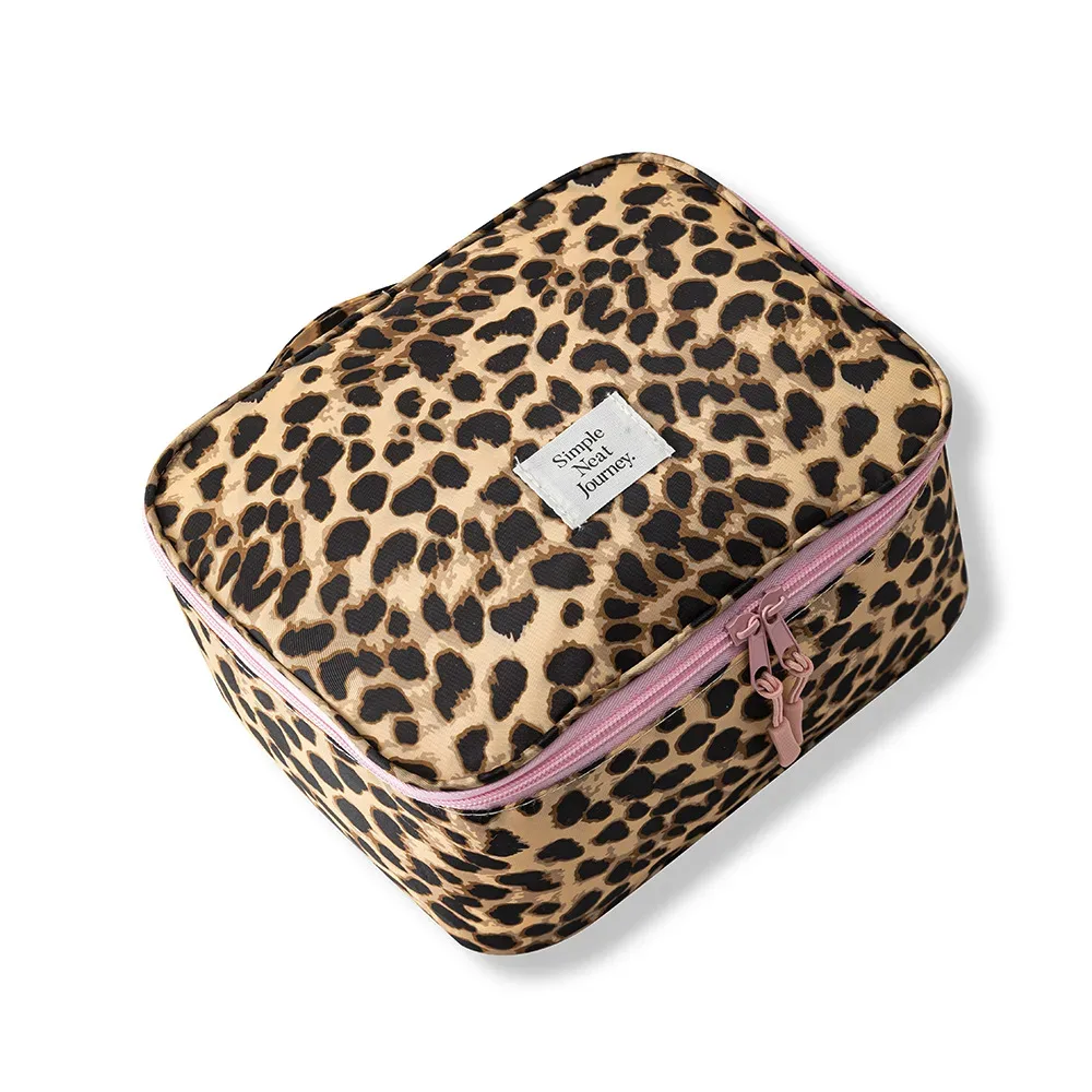 trousse de maquillage léopard grande capacité, organisateur de voyage imperméable pour cosmétiques, indispensable pour les voyages d'affaires et les bagages pour femmes