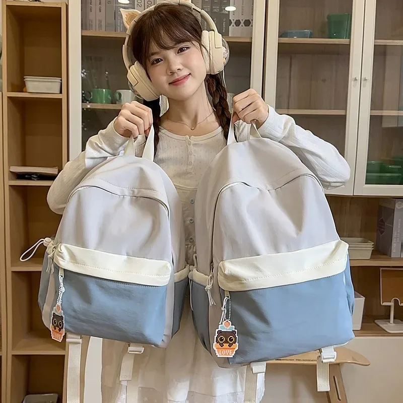 nouveau sac à dos de style japonais esthétique, léger, grande capacité, bicolore, pour jeunes.