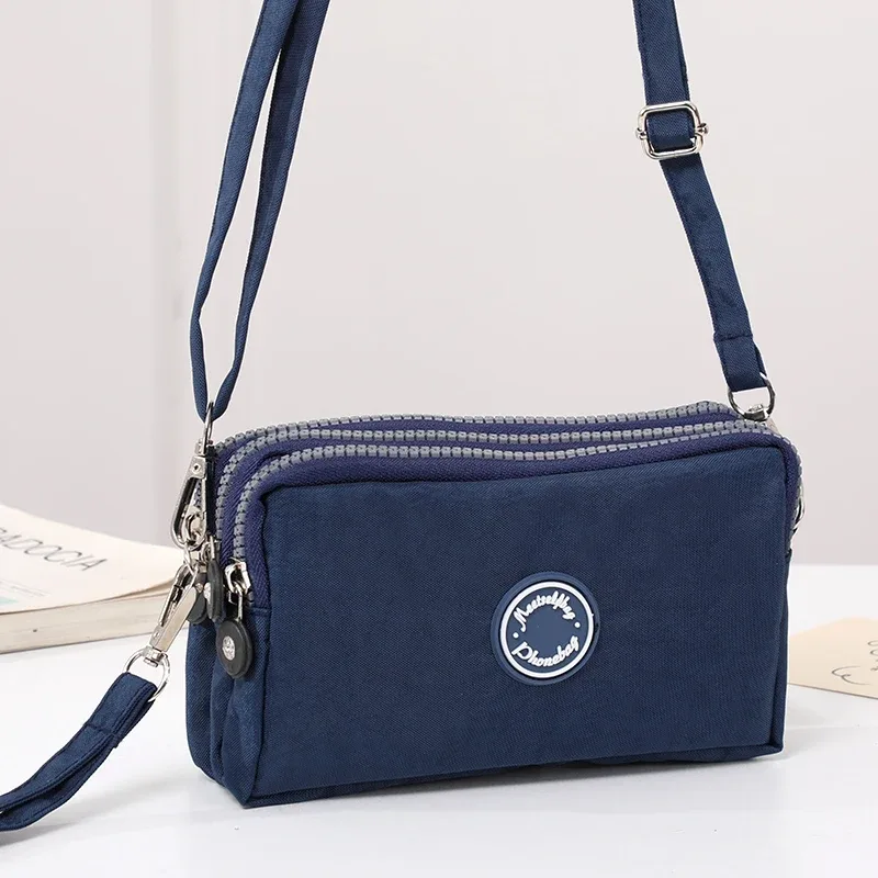 sac à bandoulière de grande capacité pour femmes, sac à bandoulière simple avec trois fermetures éclair pour téléphone et sac de rangement à changement ample