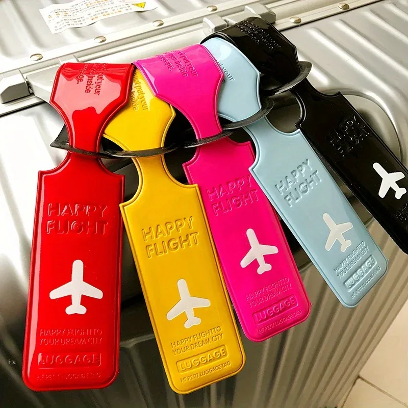 étiquette bagage plastique rouge jaune rose bleu clair noir motif avion identification voyage lot dizaine pièces