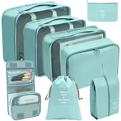 organisateur voyage polyester beige clair sac rangement vêtements chaussures sous-vêtements pochettes transparentes cubes modularité transport