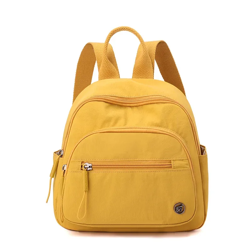 sac à dos portable en nylon pour femme, couleur unie, léger, multi-poches, décontracté, tendance, imperméable, nouveau cadeau 2026