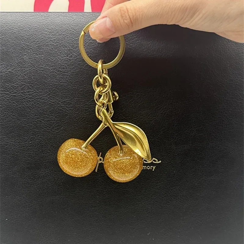 breloques de sac pour sacs fourre-tout d'entraîneur, pendentif cerise en or scintillant, porte-clés pour femmes, accessoire de noël festif