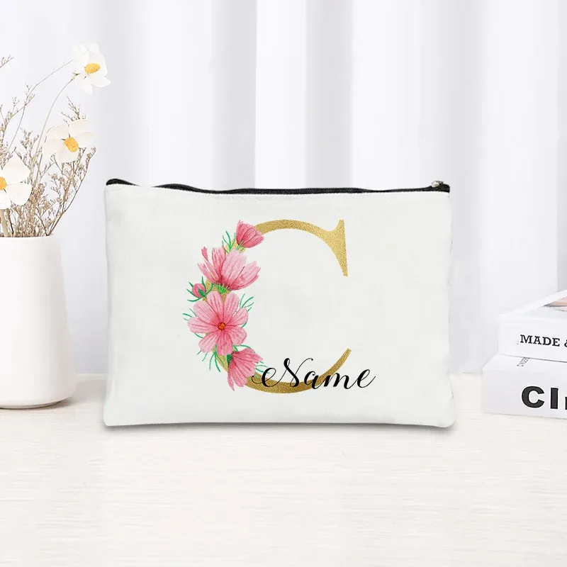 grande pochette zippée à motif floral rose et initiales dorées, organisateur d'essentiels de voyage en toile, trousse de maquillage pour enterrement de vie de jeune fille avec sac personnalisé avec nom.
