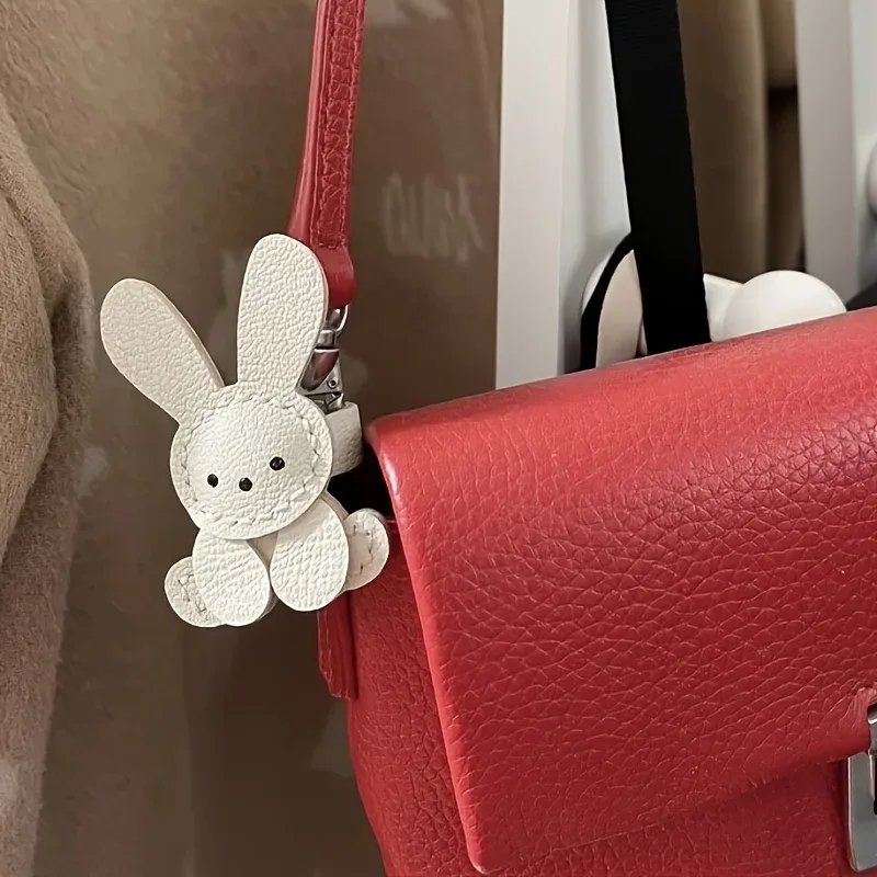 figurine lapin blanc simili cuir motif texturé poignée sac cintre sac léger accessoire voyage